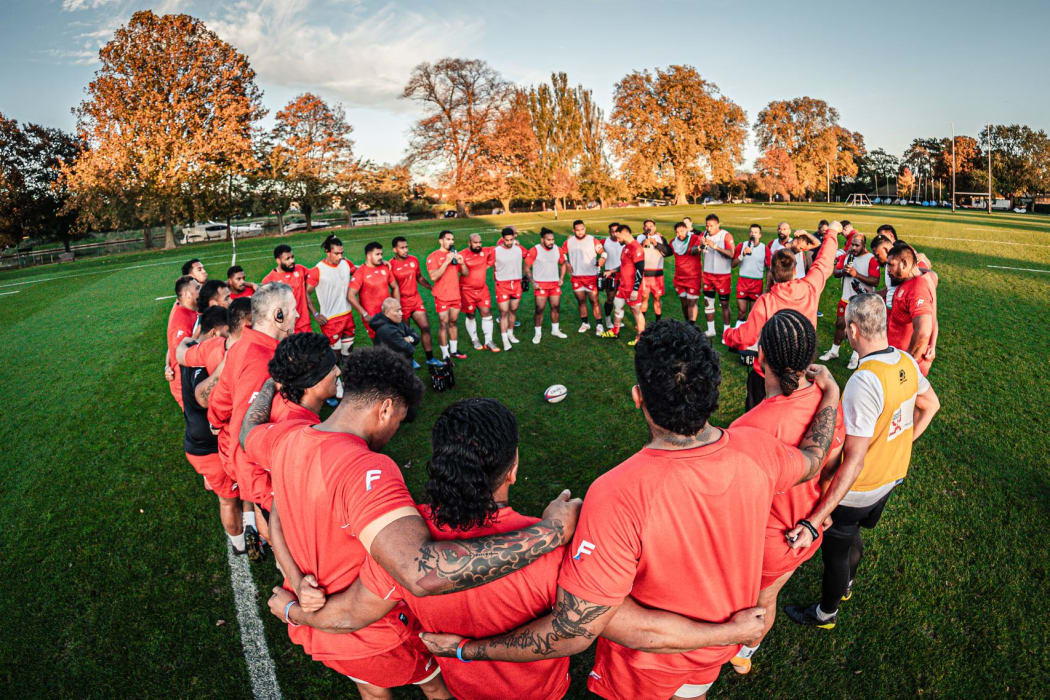 The 'Ikale Tahi squad come together during training in London.