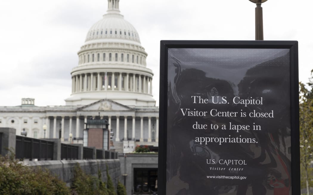 A closed sign is seen outside the US Capitol Visitor Center in Washington, DC, on October 11, 2025, on the eleventh day of the US federal government shutdown. Over 250,000 federal employees miss their paychecks this week due to the ongoing funding impasse. In the United States, government shutdowns occur when funding legislation required to finance the federal government is not enacted before the next fiscal year begins. (Photo by Aashish Kiphayet/NurPhoto) (Photo by Aashish Kiphayet / NurPhoto via AFP)