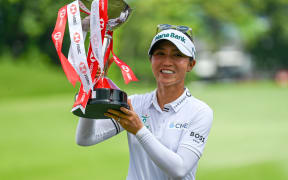 Lydia Ko with the trophy after winning the HSBC Women's Championship golf tournament at Sentosa Golf Club in Singapore.