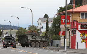 A Defence Force LAV (light armoured vehicle) heads up Chaucer Road during the Napier Siege.