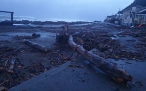 Debris on the shore after southerly gales and large swells at Owhiro Bay, Wellington, 2 July 2020.