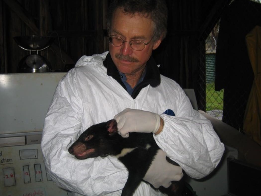 David Quammen with a Tasmanian Devil