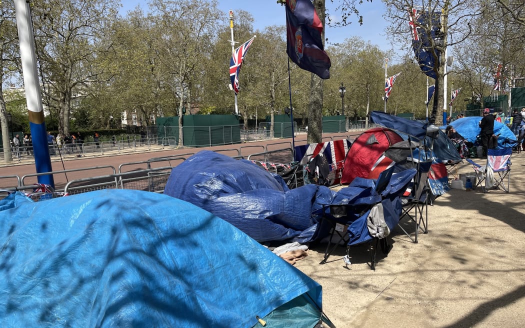 An array of tents and shelters has been set up along The Mall, the road leading to Buckingham Palace, as people crowd in ahead of the King's Coronation to get a good view of the procession.