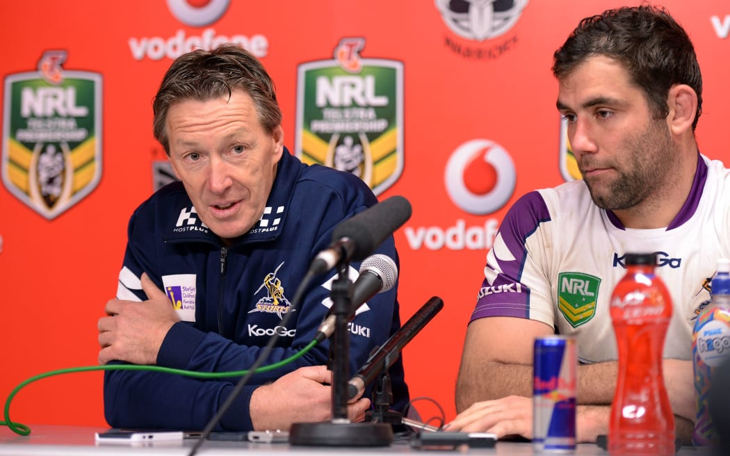Melbourne Storm coach Craig Bellamy (L) and captain Cameron Smith