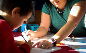 Teacher and student at Linwood Primary School, Christchurch.