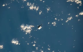 The toolbag is orbiting earth.