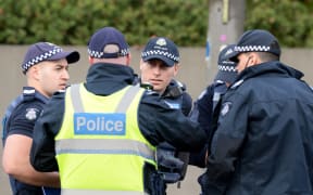 Police at the scene the siege in the suburb of Brighton on 6 June.