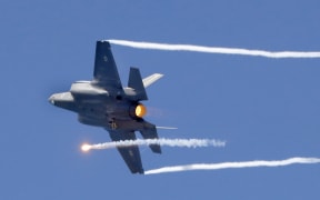An Israeli F-35 fighter jets performs during an air show, over Tel Aviv, on May 9, 2019.