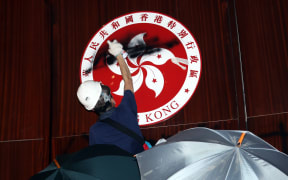 Protesters storm the Legislative Council building in Hong Kong.