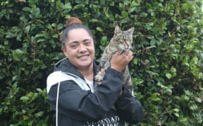 Winton woman Torria Cummings happy and heartened to be reunited with her cat Ceaser after four years missing. PHOTO: LUISA GIRAO
