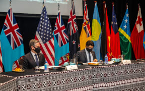 US Secretary of State Antony Blinken (L) attends a meeting with Fijian acting Prime Minister Aiyaz Sayed-Khaiyum (R) in Nadi, Fiji, on February 12, 2022.