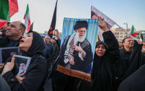 People mourn the death of Iran’s Supreme Leader Ayatollah Ali Khamenei, who was killed in joint US and Israeli strikes, at a square in Tehran on 1 March 1, 2026.
