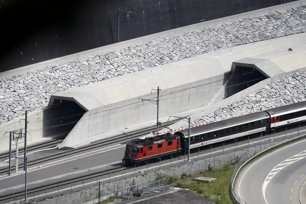 [s] The world's longest and deepest rail tunnel is to be officially opened in Switzerland, after almost two decades of construction work.