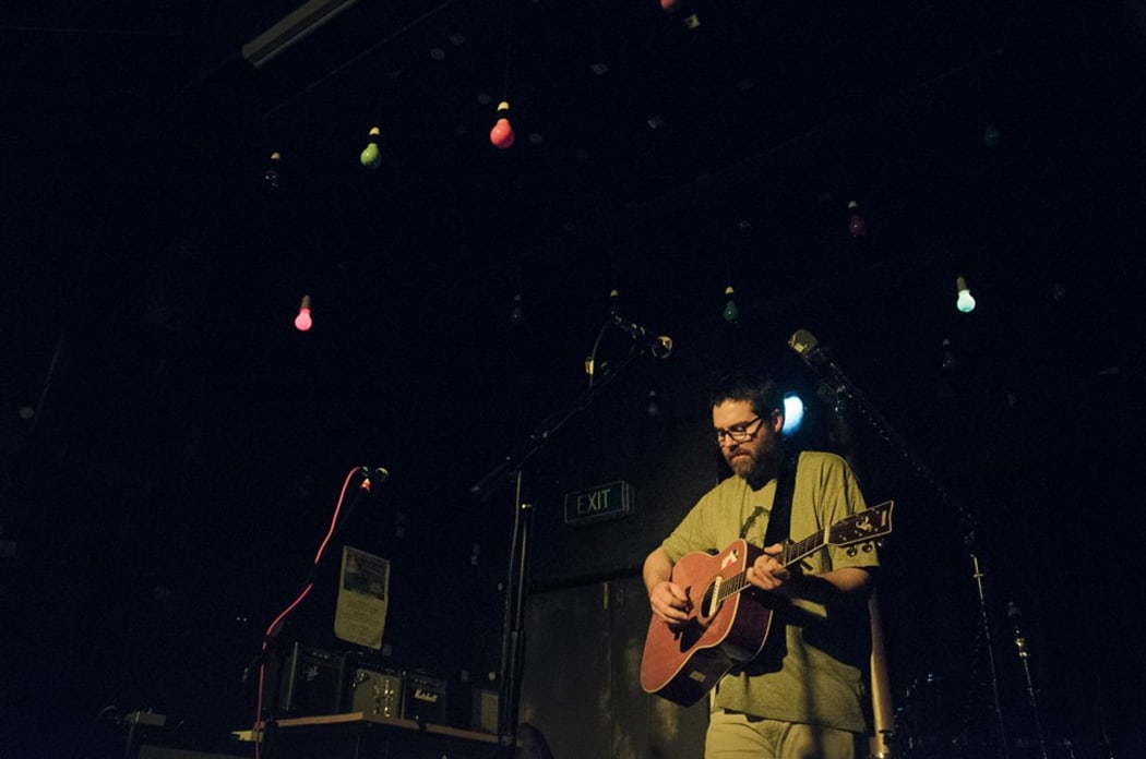 Samuel Flynn Scott perform at the Renters United fundraiser