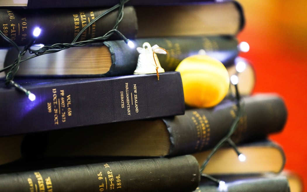 The Hansard team show off their festive decorating skills.