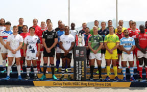 The captains of all 28 teams competing in Hong Kong pose for the camera.