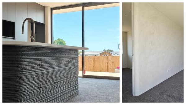 An interior shot showing a rough-hewn concrete kitchen island.