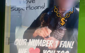 Superloans displayed a photoshopped poster featuring a woman who vandalised their storefront.