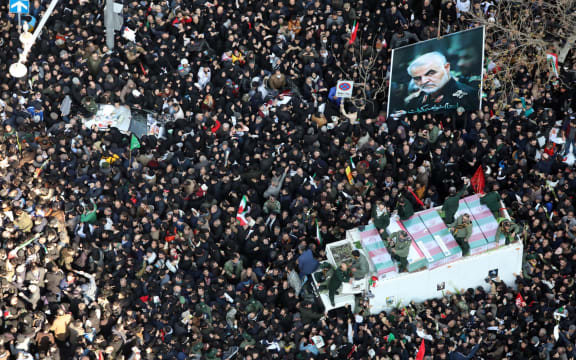 Massive crowds attend the funeral of military commander Qassem Soleimani, killed in a US drone attack.