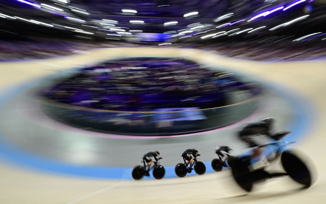 New Zealand's Ally Wollaston, New Zealand's Bryony Botha, New Zealand's Emily Shearman and New Zealand's Nicole Shields compete in a women's track cycling team pursuit first round of the Paris 2024 Olympic Games at the Saint-Quentin-en-Yvelines National Velodrome in Montigny-le-Bretonneux, south-west of Paris, on August 7, 2024. (Photo by John MACDOUGALL / AFP)