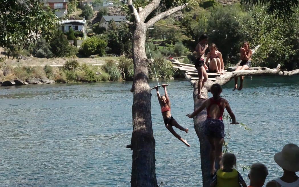 Young people keeping cool in the heat at Alexandra.