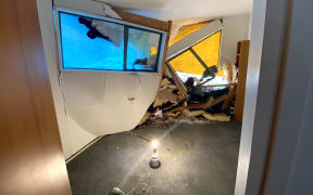 Damage from where a tree fell through Rob Gaston's Titirangi home.