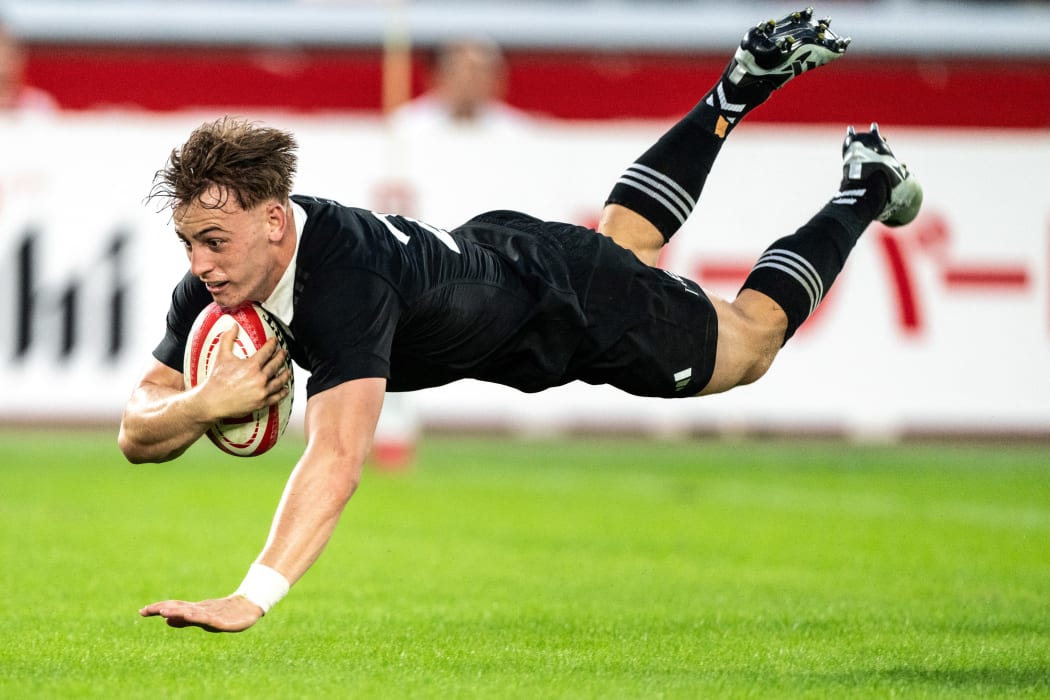 New Zealand's Ruben Love scores a try during the rugby union test match between New Zealand and Japan at Nissan Stadium in Yokohama, Kanagawa prefecture, south of Tokyo on October 26, 2024. (Photo by Philip FONG / AFP)