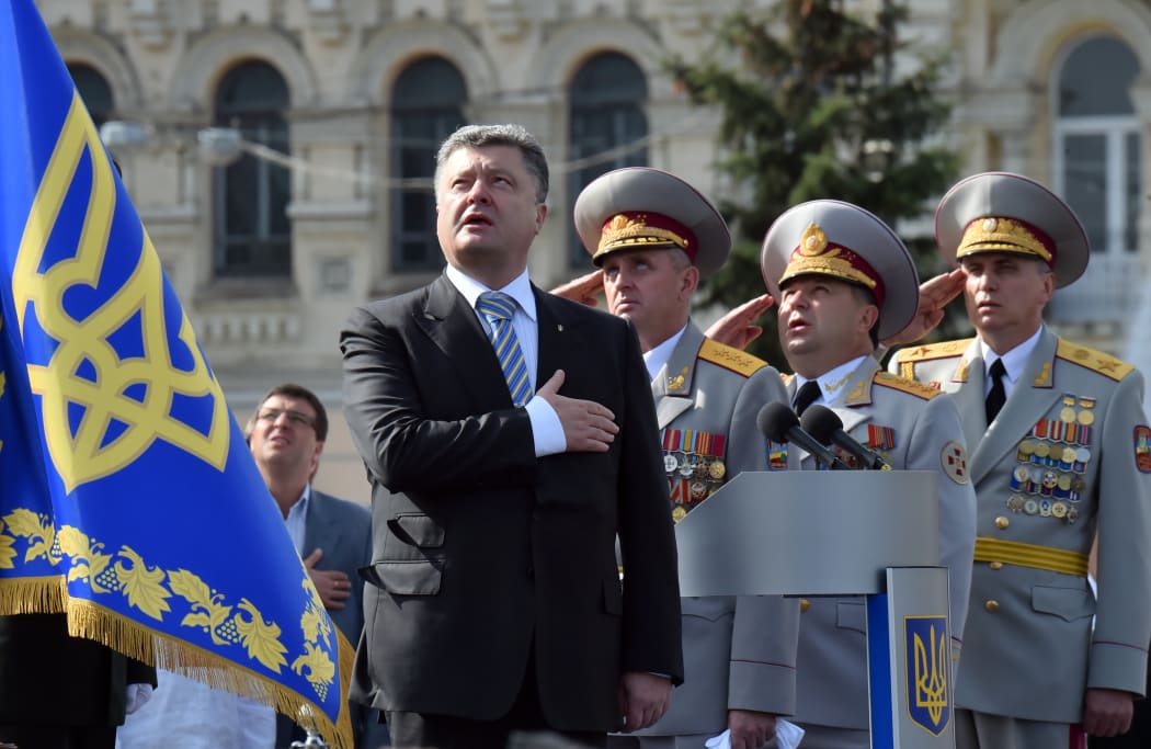 President Petro Poroshenko and the supreme command staff at a parade on Sunday marking the anniversary of Ukraine's independence.