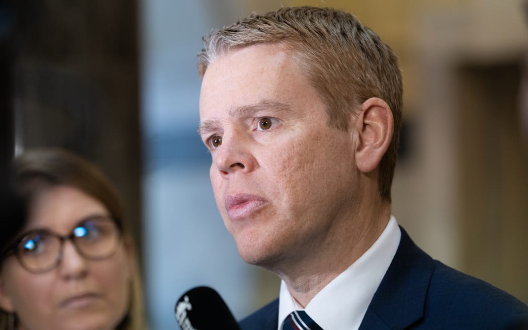 Prime Minister Chris Hipkins talks to journalists.