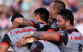 The Warriors celebrate their golden-point victory.
