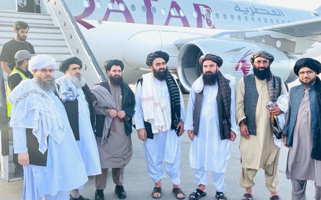 A high level Taliban delegation led by Foreign Minister Maulvi Amir Khan Mottaki (center) leave for Qatar. Senior Taliban officials and US representatives are to hold talks Saturday Oct 9 and Sunday Oct 10.