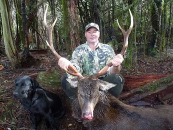 Brian Elwarth with a sika deer.