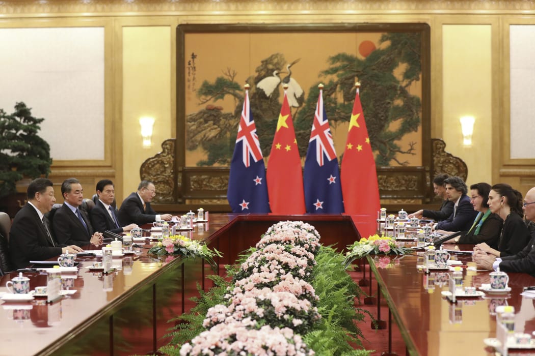 China's President Xi Jinping (left) attends a meeting with Prime Minister Jacinda Ardern at the Great Hall of the People in Beijing.