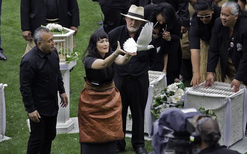 Nadene releases doves at the close of the ceremony.