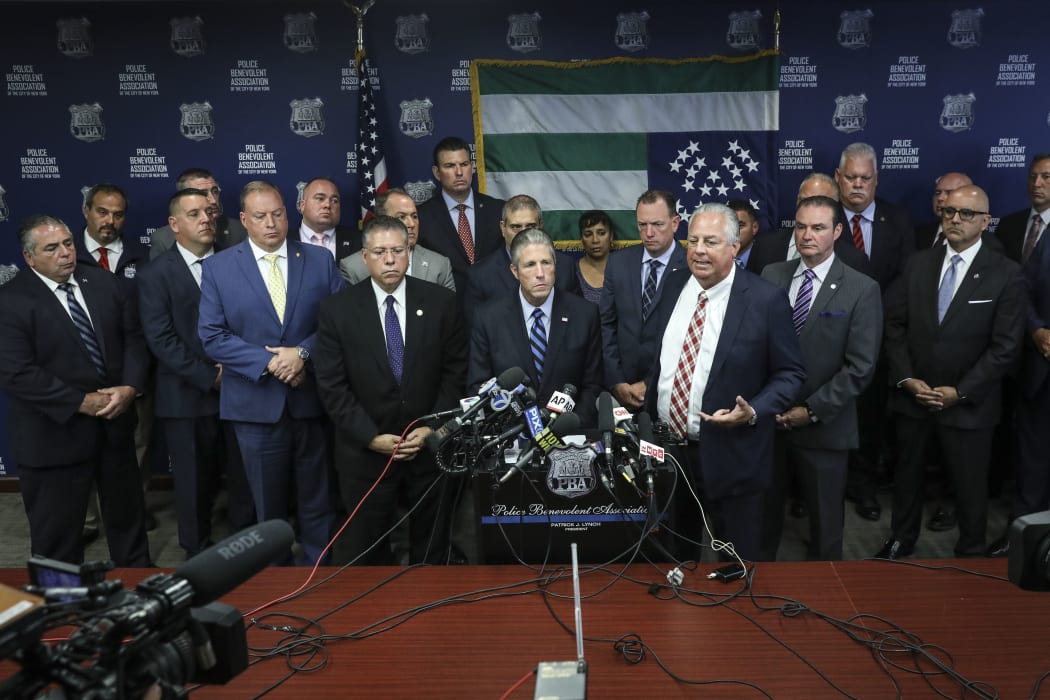 Pat Lynch (C), president of the NYC Police Benevolent Association, speaks during a press conference after the announcement of the termination of officer Daniel Pantaleo.