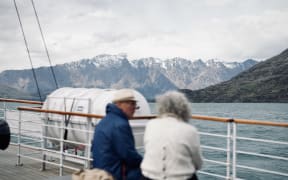 Tourists on a boat in Queenstown. Photo taken in November 2025.