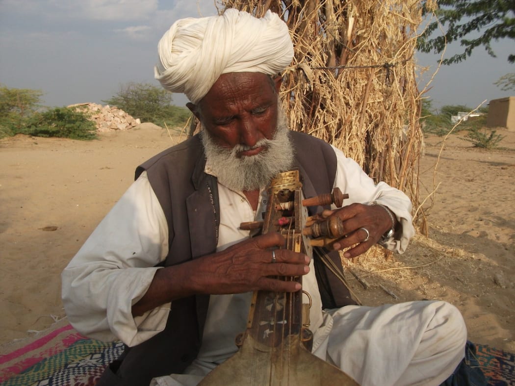 Hindal Khan from Dhantal village plays the kamaicha