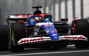 Liam Lawson driving on the Interlagos Circuit, in Sao Paulo.