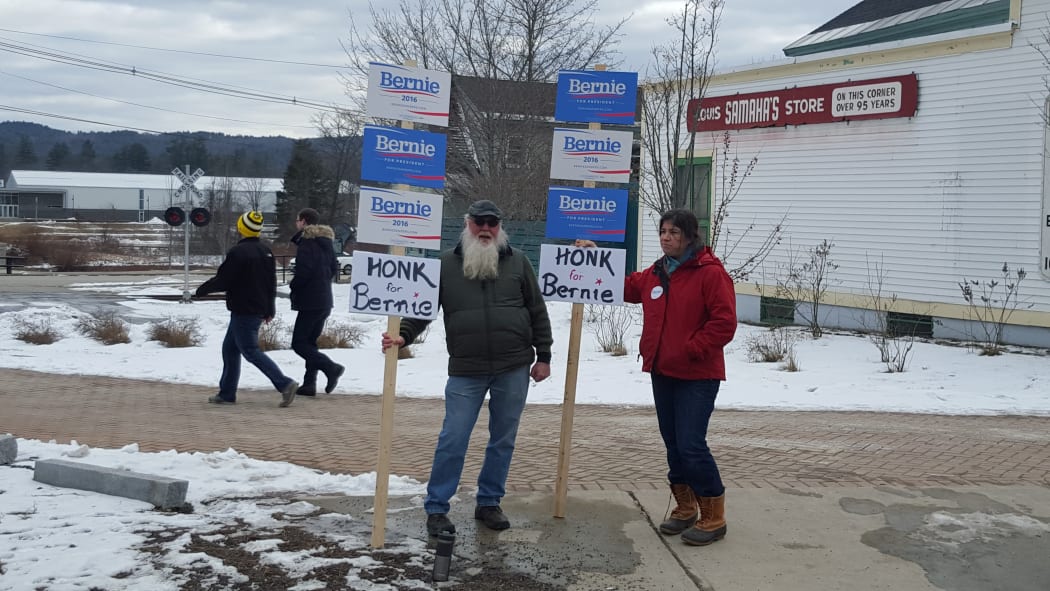 Bernie Sanders supporters Stephen Woodbury and Kristin Walsh on the main street of Plymouth, New Hampshire.