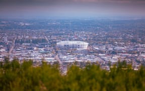 Christchurch Central City from the Port Hills Summit Road. Te Kaha Stadium