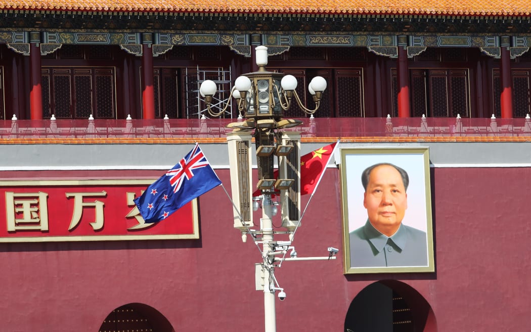 China and New Zealand flags in front of the Tian'anmen Rostrum in Beijing.
