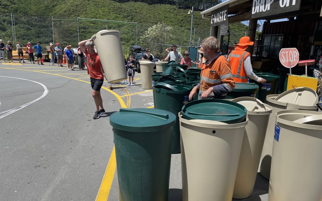 People waited hours in the hot sun to purchase discounted 200-litre water tanks at the southern landfill's Tip Shop on Tuesday in Wellington.
