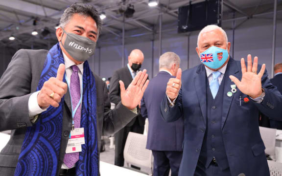 Fijian Prime Minister, Hon Voreque Bainimarama (right) with Samoa’s Permanent Representative to the United Nations, Ambassador Fatumanava Luteru (left) at COP26 in Glasgow