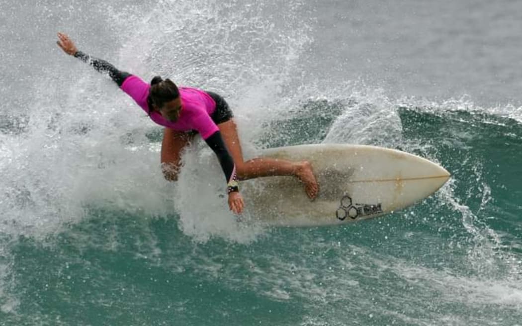 female surfer