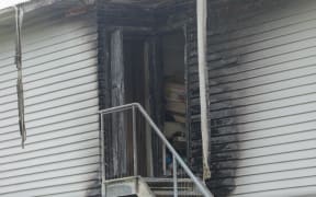 Emergency services at the scene of a house fire on Hanson Grove in Lower Hutt's Stokes Valley on 5 November 2024.