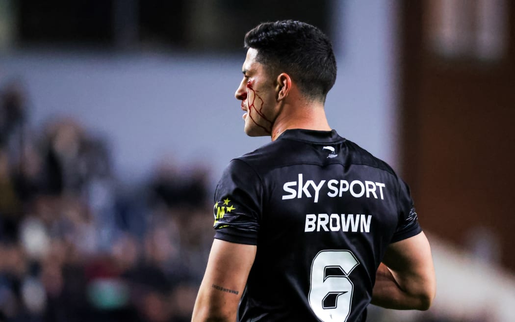 New Zealand’s Dylan Brown looks on with blood running down his face at the Rugby League World Cup England 2022.