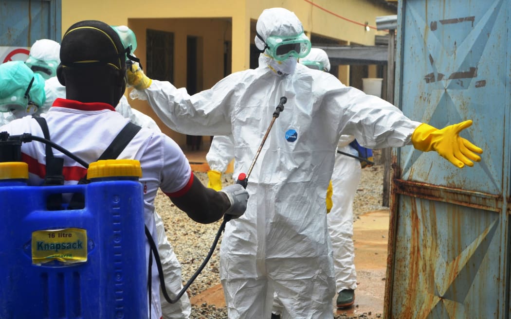 Guinea's Red Cross health workers wearing protective suits to protect them from Ebola