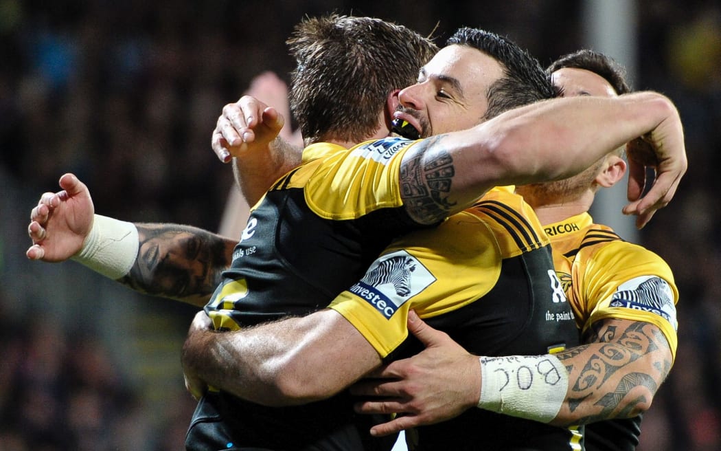 The Hurricanes celebrate a try.
