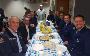 Police officers join in iftar at NZMA's islamic centres this year during Ramadan.