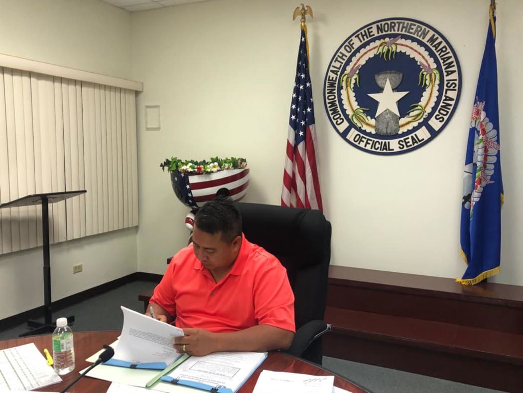 Governor Ralph Torres signs the Budget Bill into law